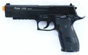 A replica airsoft gun with an orange ring on the barrel